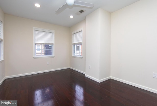 unfurnished room with hardwood / wood-style flooring and ceiling fan