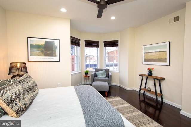 bedroom featuring dark wood-type flooring and ceiling fan