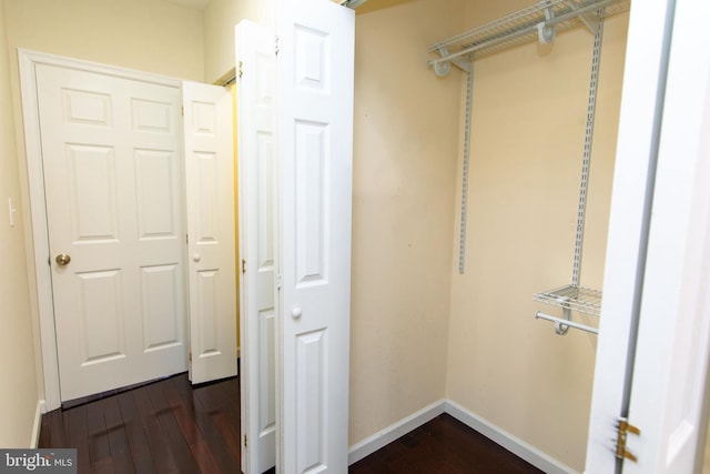 hallway featuring dark hardwood / wood-style floors