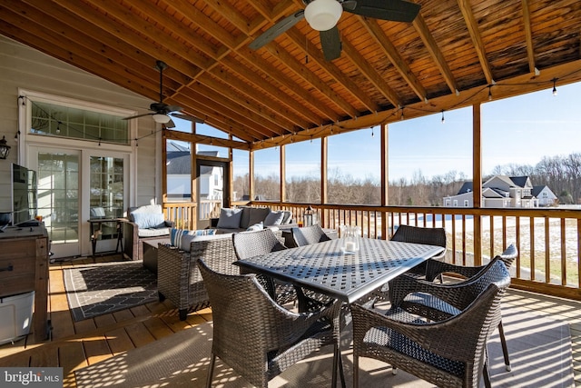 sunroom featuring a wealth of natural light, vaulted ceiling, wooden ceiling, and ceiling fan