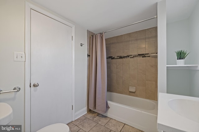 full bathroom with tile patterned floors, toilet, shower / bath combo with shower curtain, and vanity