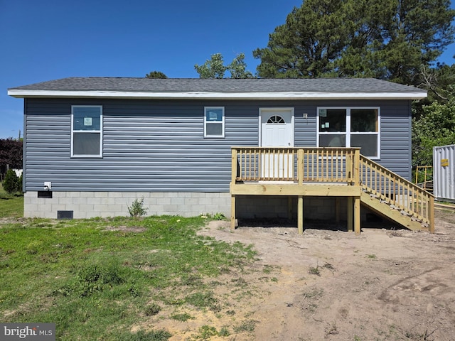 26404 Franklin Ln, Crisfield, MD 21817 - view of front of property with a wooden deck, a shingled roof, crawl space, and a front yard