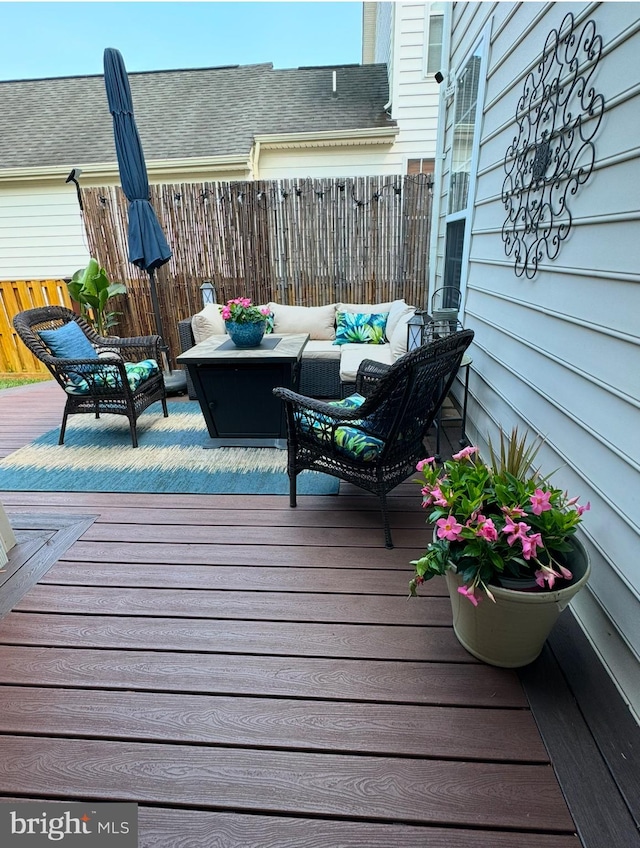 deck with outdoor lounge area