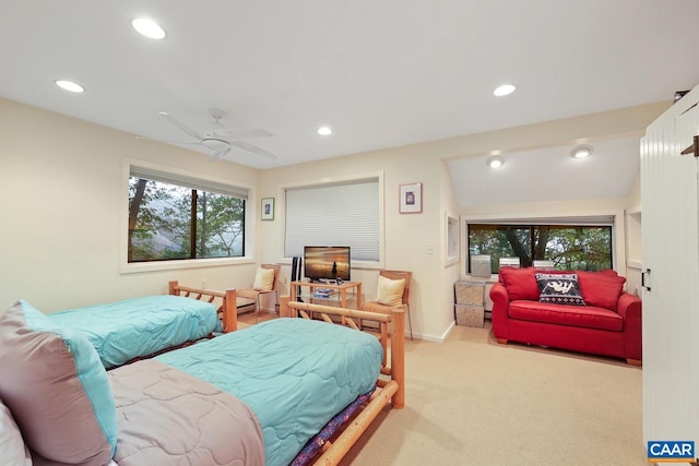 bedroom with light colored carpet and ceiling fan