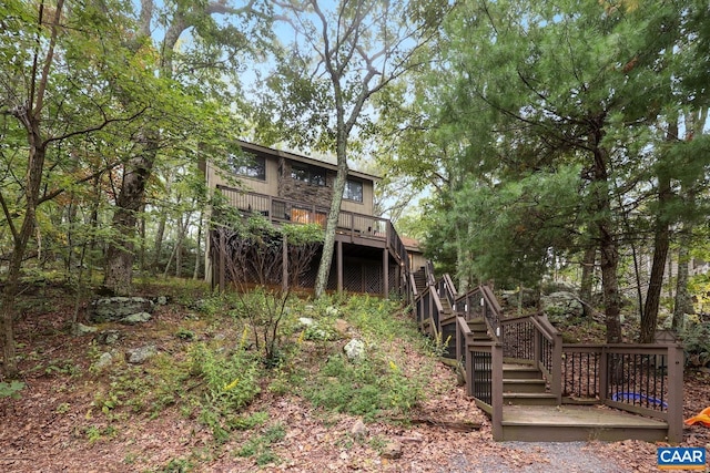 rear view of house with a deck