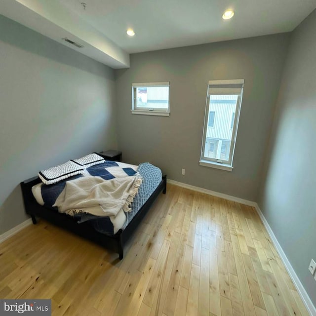 bedroom featuring light hardwood / wood-style floors