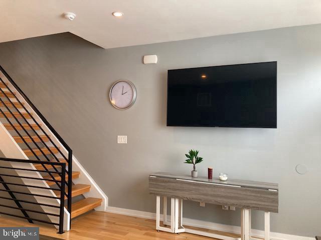 interior space with hardwood / wood-style flooring