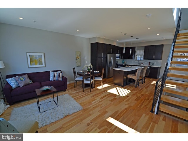 living room featuring light wood-type flooring