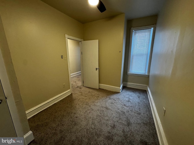 unfurnished bedroom featuring carpet flooring and ceiling fan