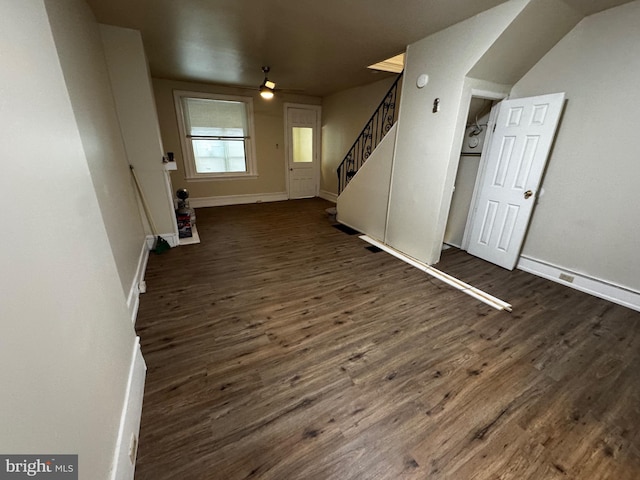 entrance foyer with ceiling fan and dark hardwood / wood-style flooring