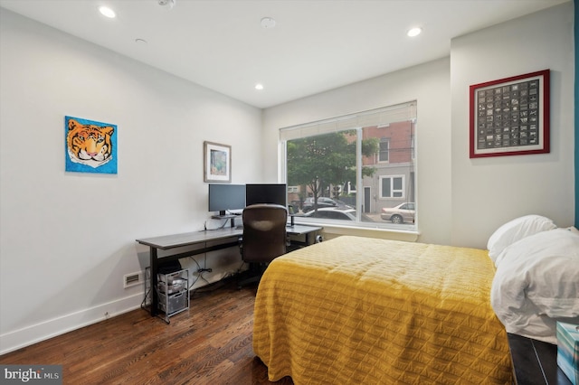 bedroom featuring dark hardwood / wood-style floors