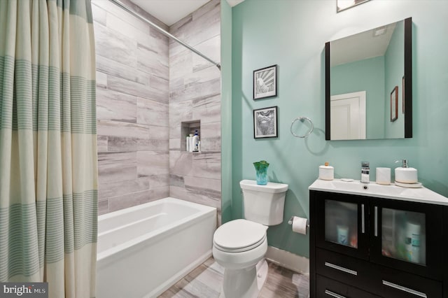 full bathroom featuring shower / tub combo with curtain, vanity, and toilet