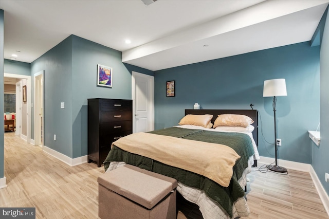 bedroom with light wood-type flooring