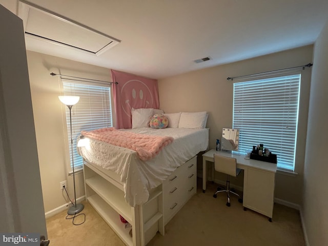 bedroom with light carpet