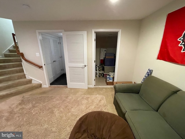 living room featuring light carpet