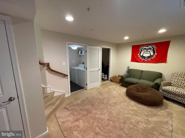 living room featuring washer and clothes dryer