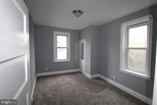 empty room with carpet floors