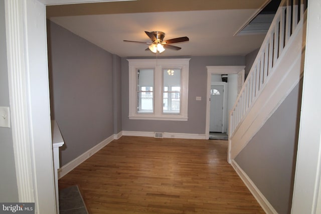 foyer featuring ceiling fan and hardwood / wood-style floors