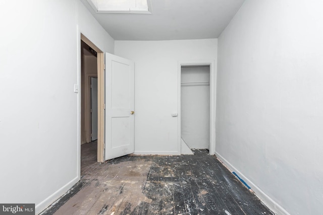 unfurnished bedroom with a closet