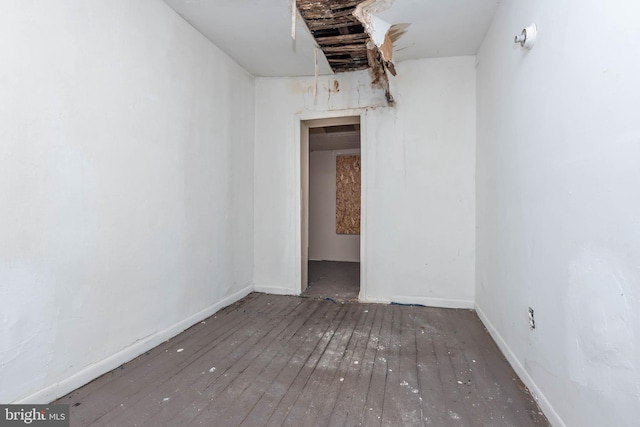 empty room featuring dark hardwood / wood-style floors