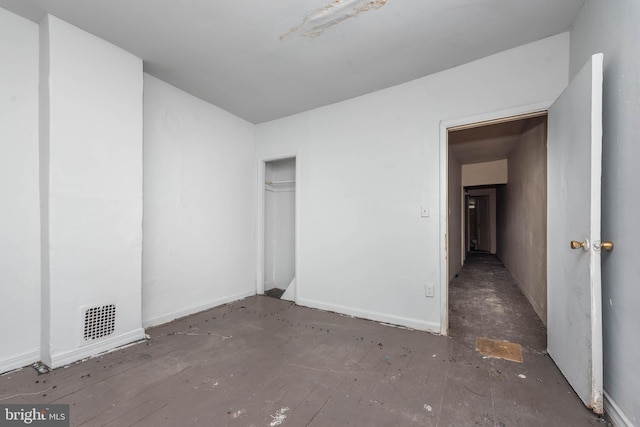 unfurnished bedroom featuring a closet