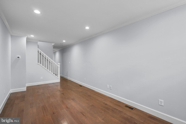 interior space with crown molding and wood-type flooring