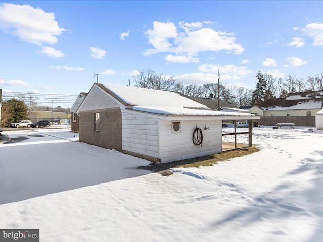 view of snow covered property