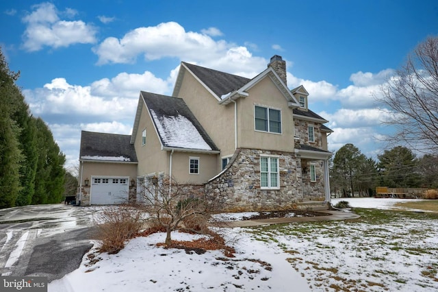 view of front of property featuring a garage