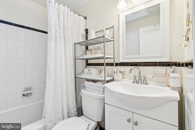 full bathroom featuring shower / tub combo, decorative backsplash, vanity, and toilet