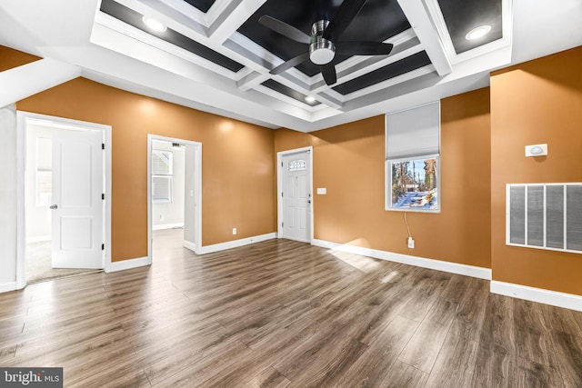 interior space with hardwood / wood-style flooring, ceiling fan, and ornamental molding