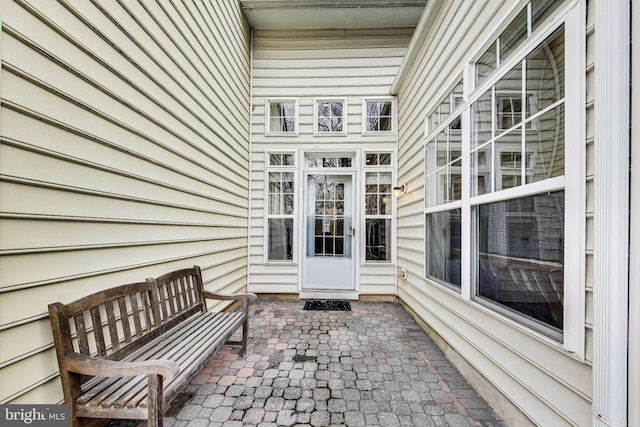 entrance to property with a patio area