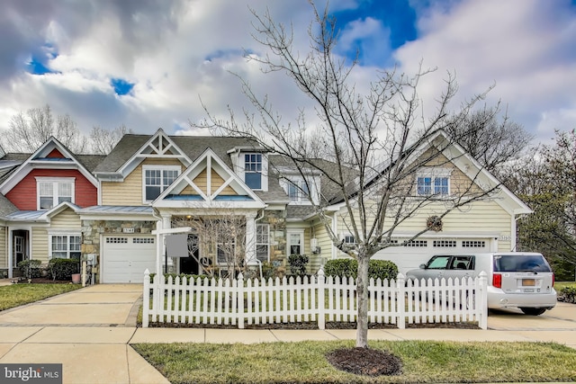 craftsman inspired home with a garage