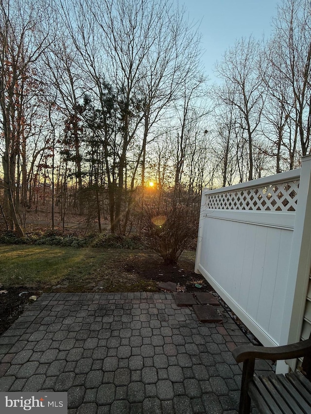 view of patio terrace at dusk