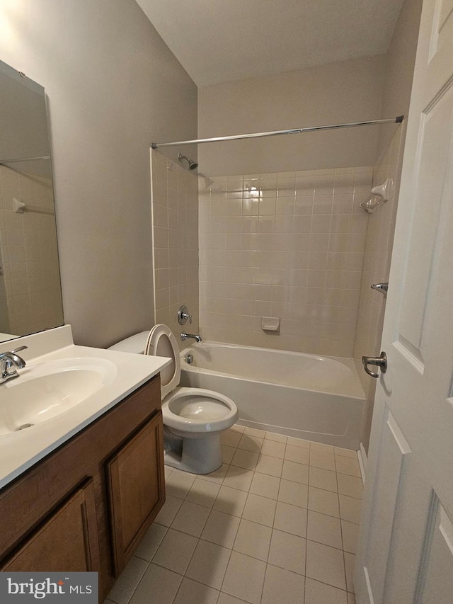 full bathroom with vanity,  shower combination, tile patterned floors, and toilet