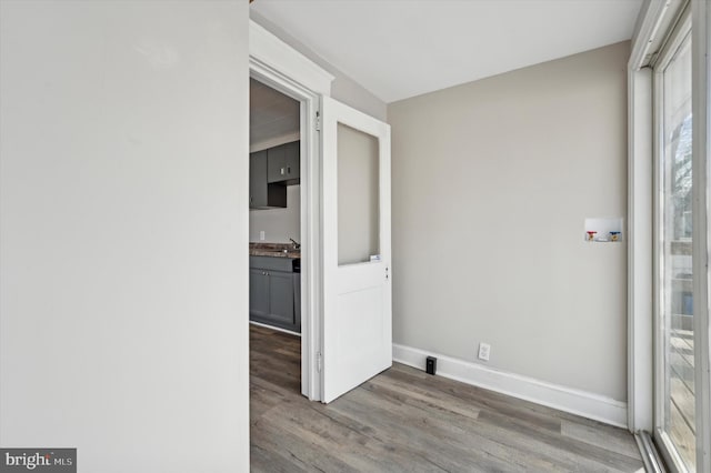 empty room with wood-type flooring