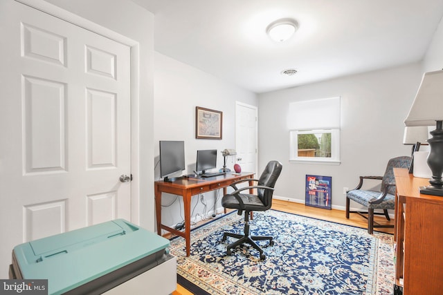 home office featuring wood-type flooring