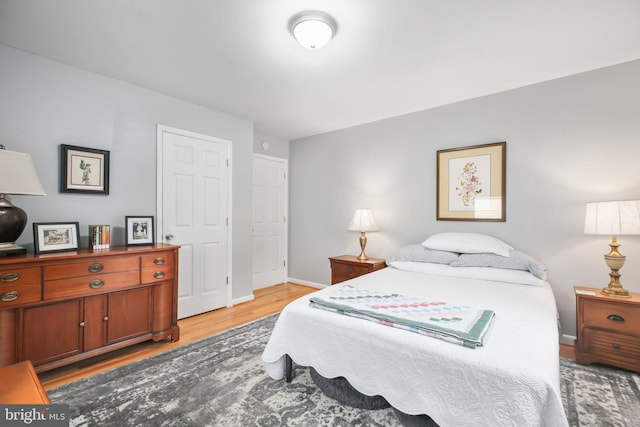 bedroom with light hardwood / wood-style flooring