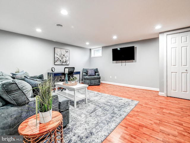 living room with hardwood / wood-style flooring