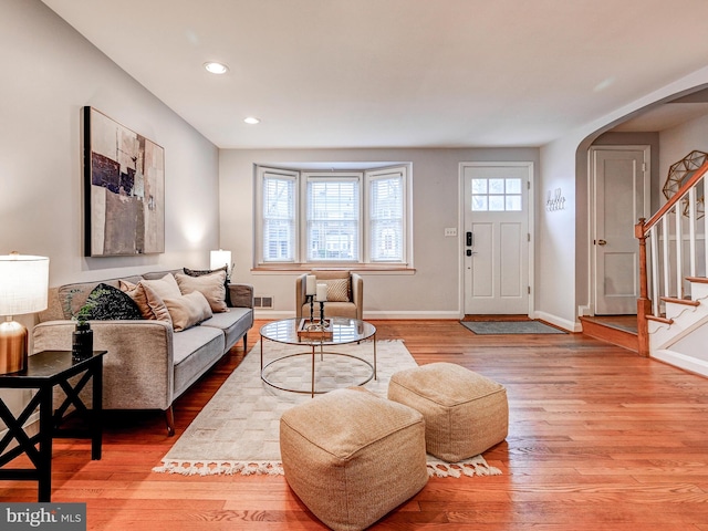 living room with hardwood / wood-style floors