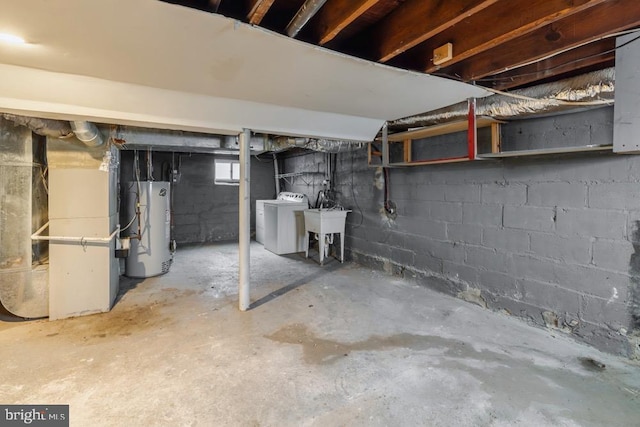 basement with gas water heater and sink