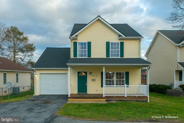 view of front of house featuring a front lawn, central AC unit, a porch, and a garage