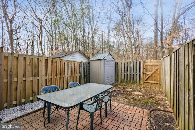 view of patio featuring a shed