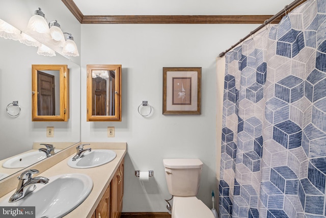 bathroom featuring vanity, crown molding, toilet, and a shower with shower curtain