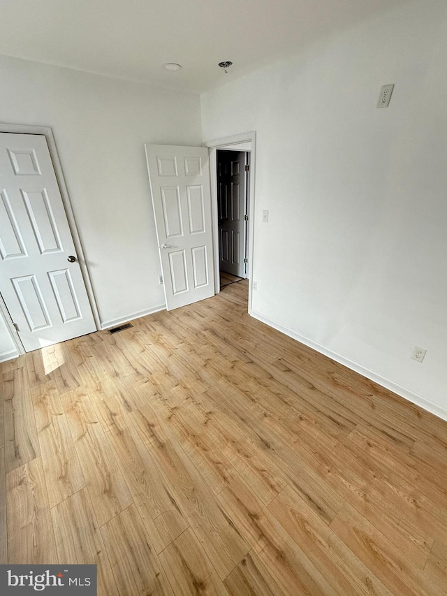 empty room featuring light hardwood / wood-style floors