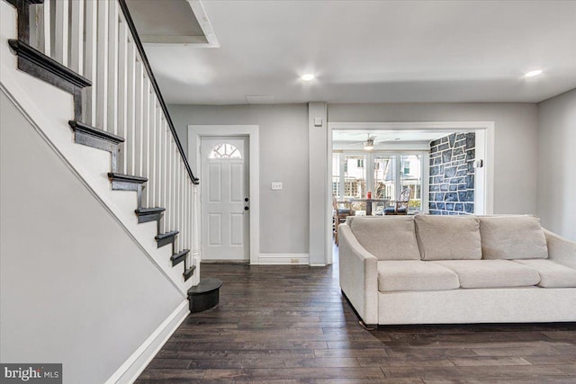 living room with dark wood-type flooring