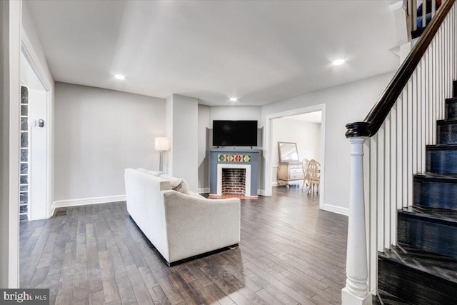 living room featuring dark hardwood / wood-style flooring