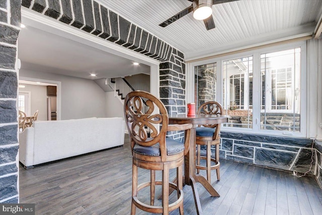 interior space featuring crown molding, plenty of natural light, hardwood / wood-style floors, and ceiling fan