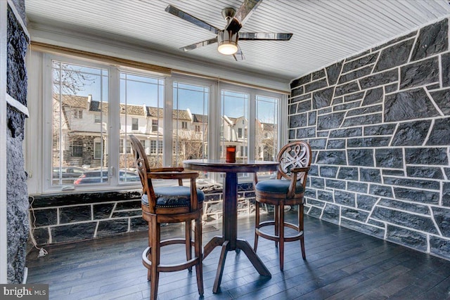 sunroom / solarium with wood ceiling and ceiling fan