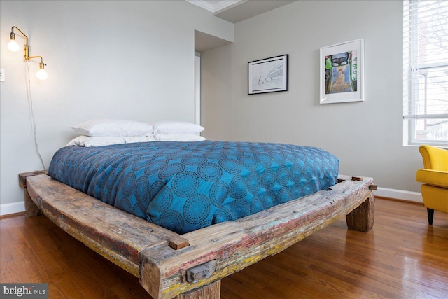 bedroom featuring wood-type flooring