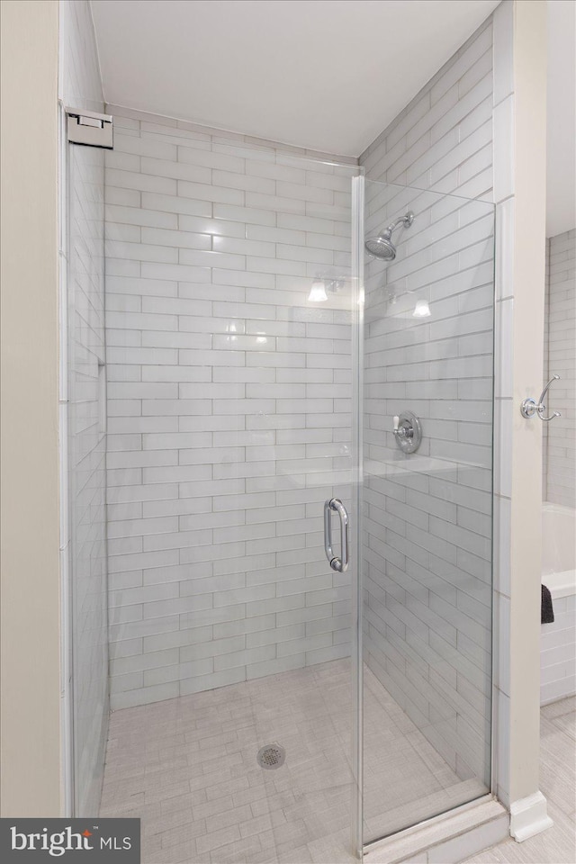 bathroom featuring walk in shower